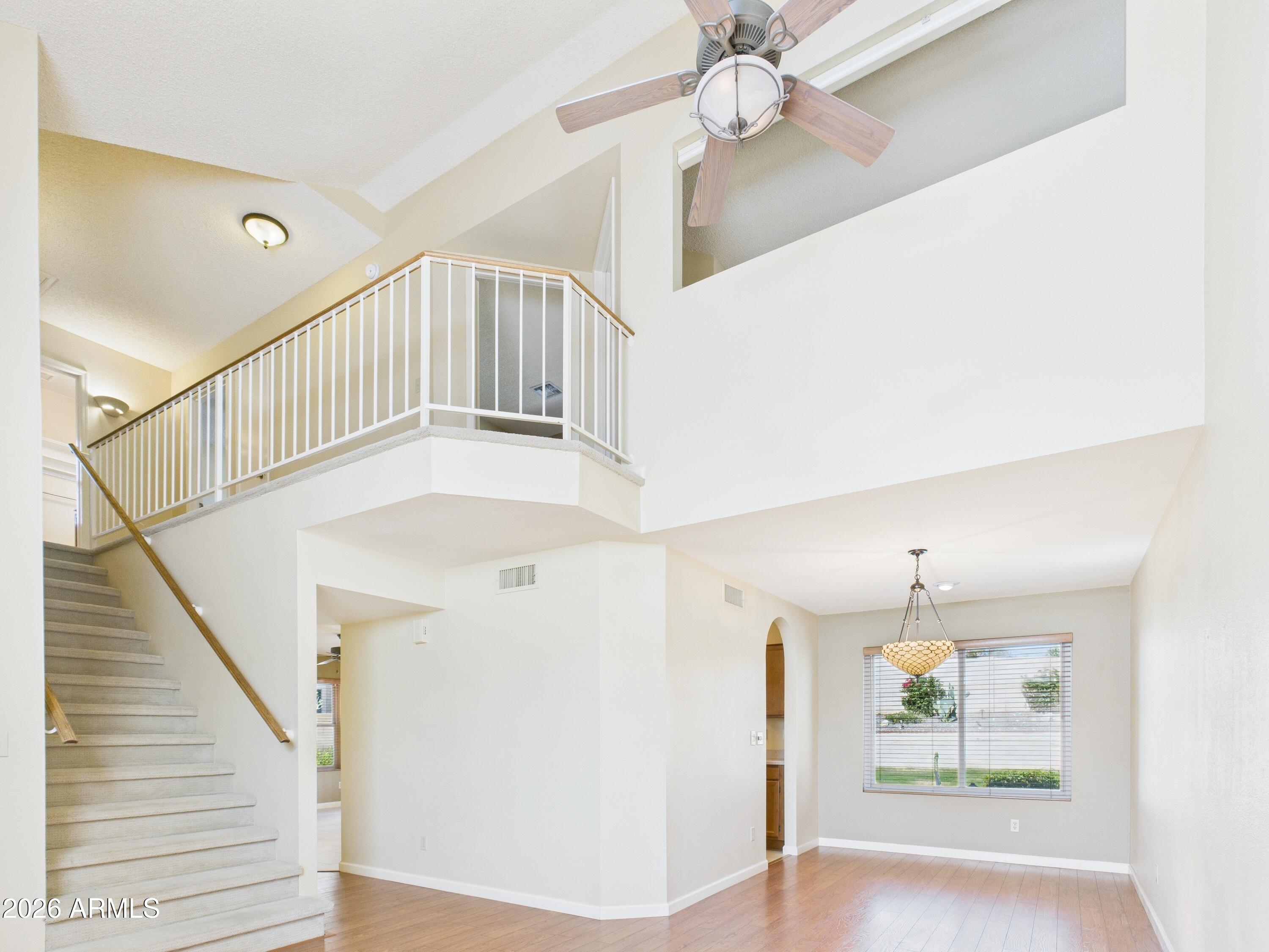 2750 East Rock Wren Road Phoenix, AZ 85048 - Photo 26 of 90 a view of entryway and hall with wooden floor
