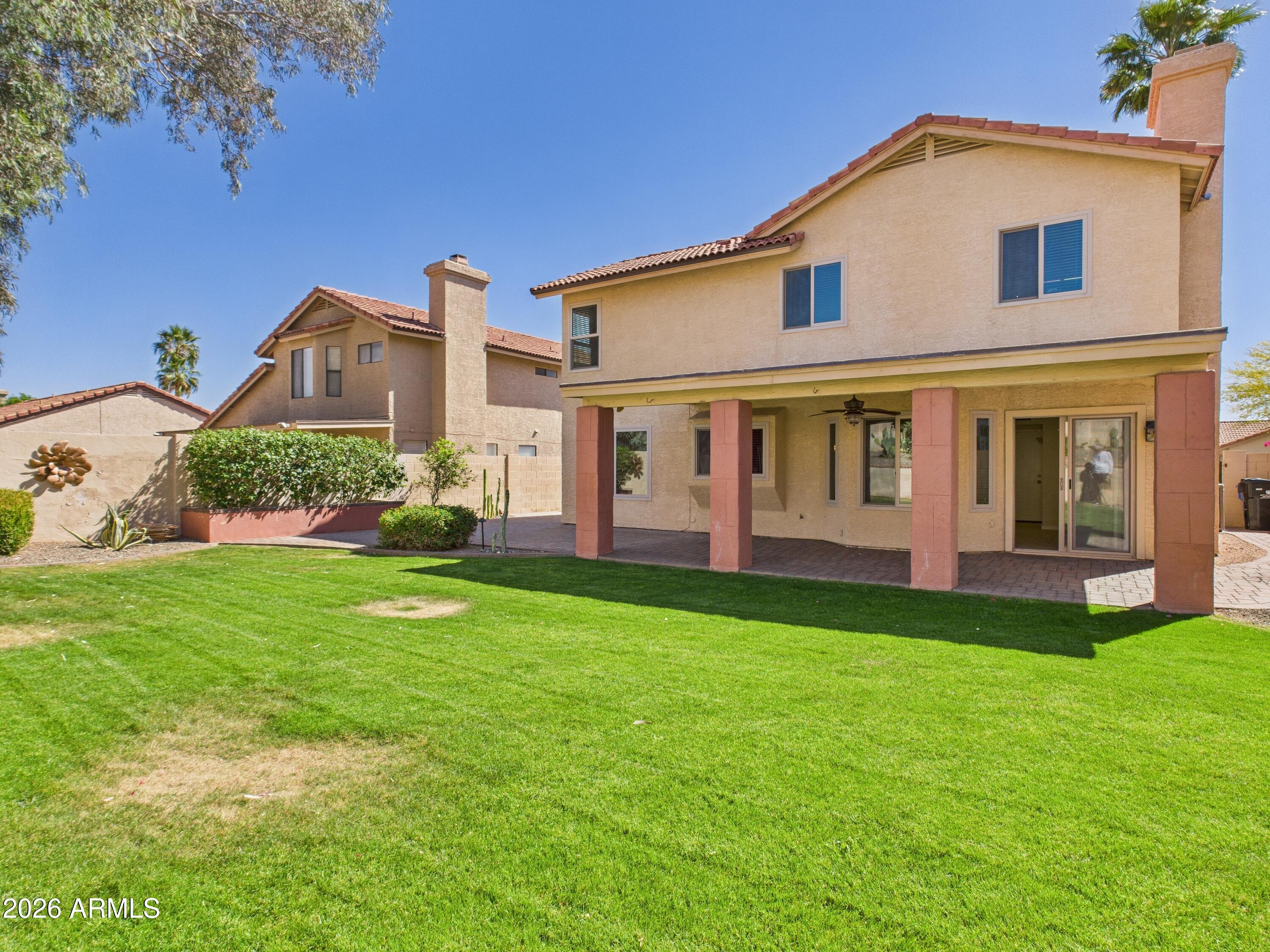 2750 East Rock Wren Road Phoenix, AZ 85048 - Photo 74 of 90 a view of a house with backyard and garden