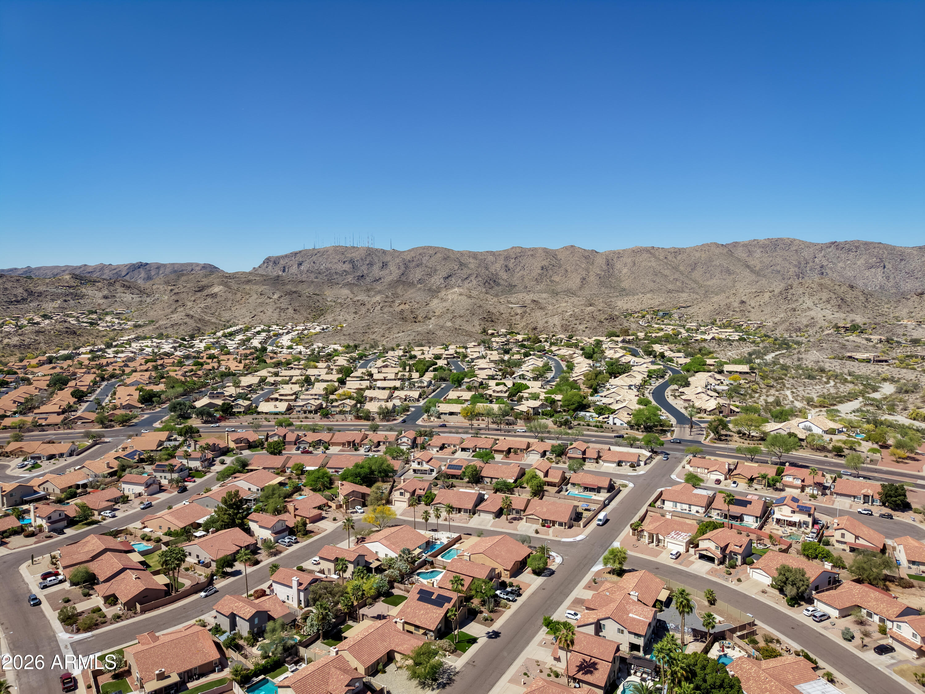 2750 East Rock Wren Road Phoenix, AZ 85048 - Photo 85 of 90 an aerial view of residential houses with outdoor space
