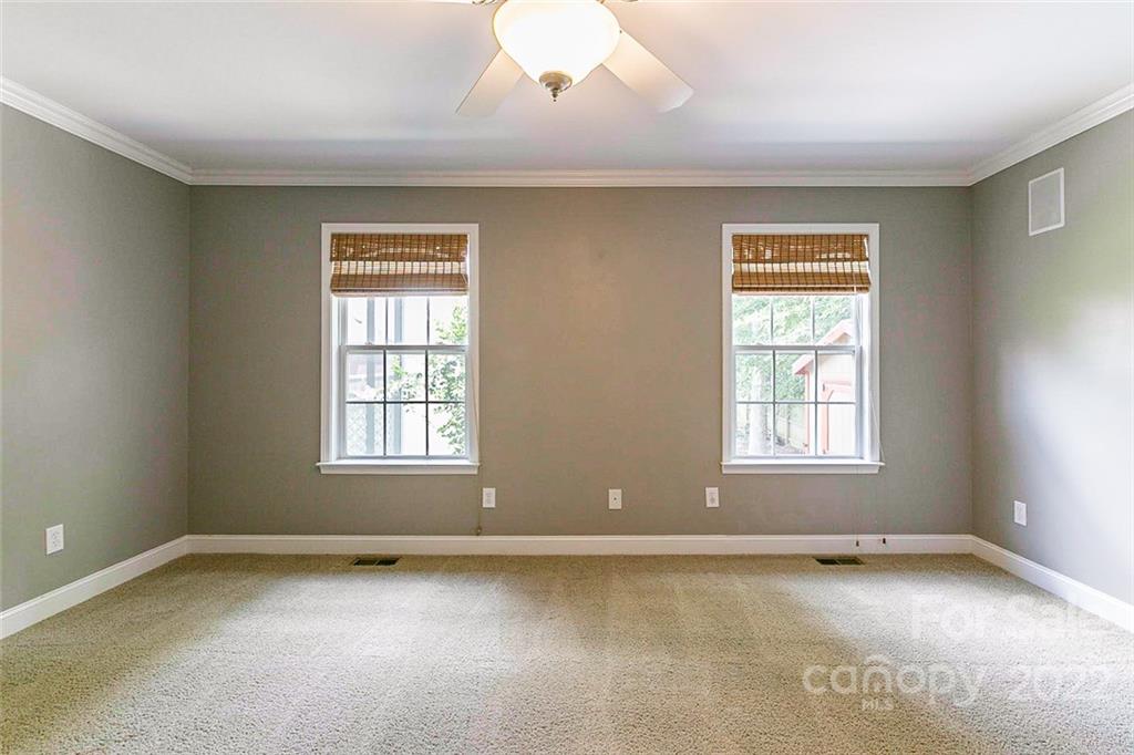 3304 Brickwood Circle Midland, NC 28107 - Photo 5 of 17 an empty room with a window