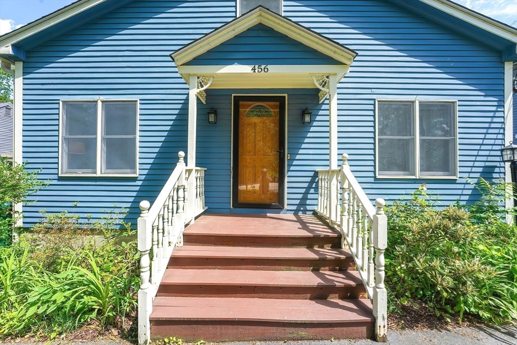 456 Gleasondale Road Stow, MA 01775 - Photo 1 of 30 a front view of a house with a window