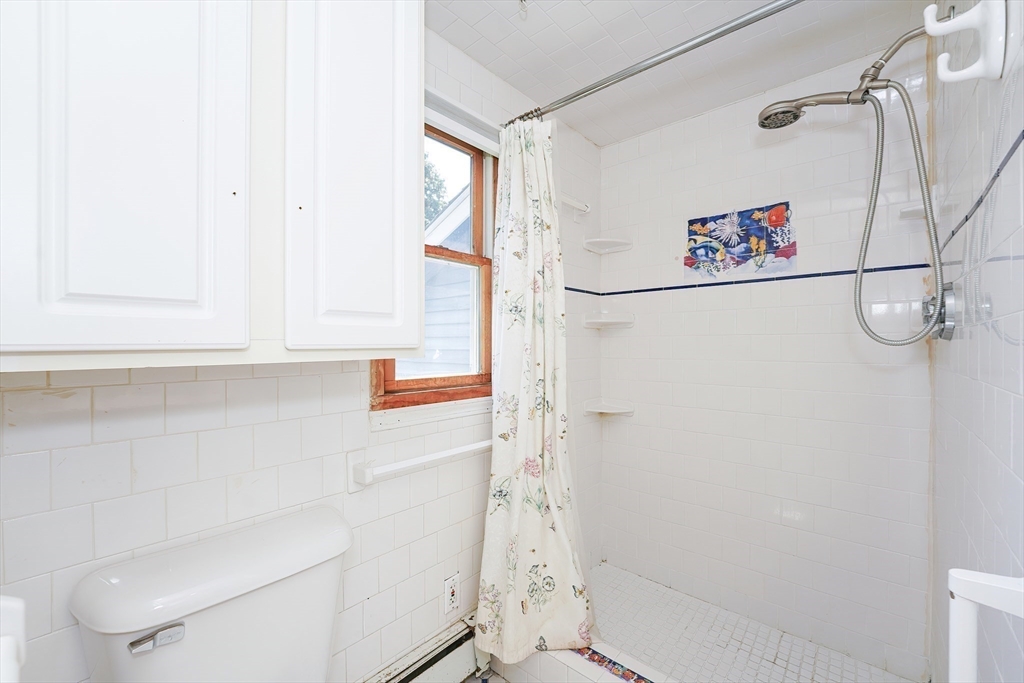 456 Gleasondale Road Stow, MA 01775 - Photo 22 of 30 a bathroom with a shower and a toilet