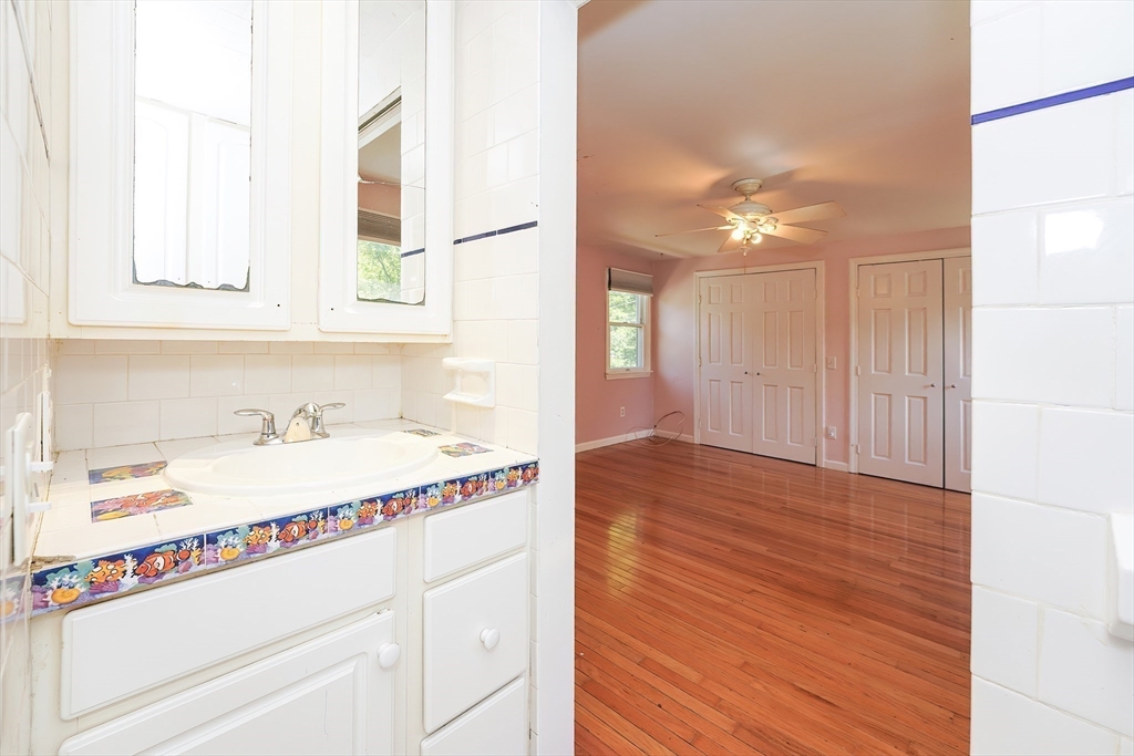 456 Gleasondale Road Stow, MA 01775 - Photo 23 of 30 a bathroom with a sink and a mirror