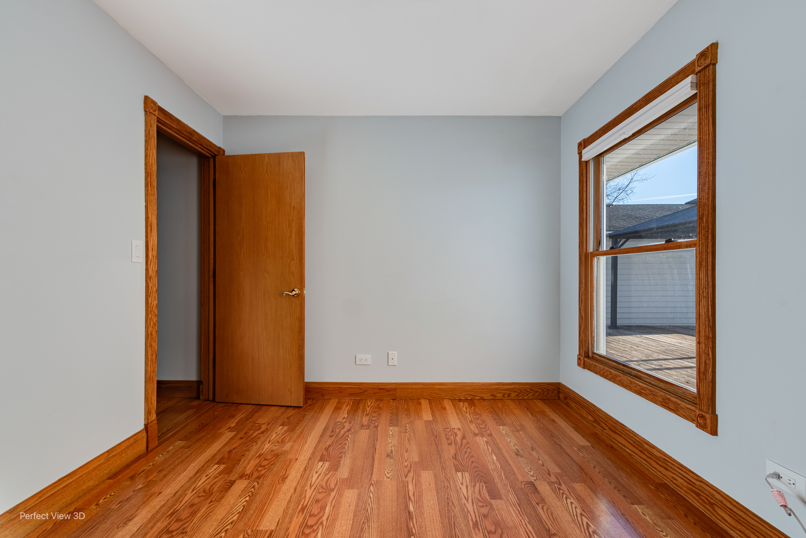 216 Kosan Circle Streamwood, IL 60107 - Photo 14 of 34 a view of an empty room with wooden floor and a window