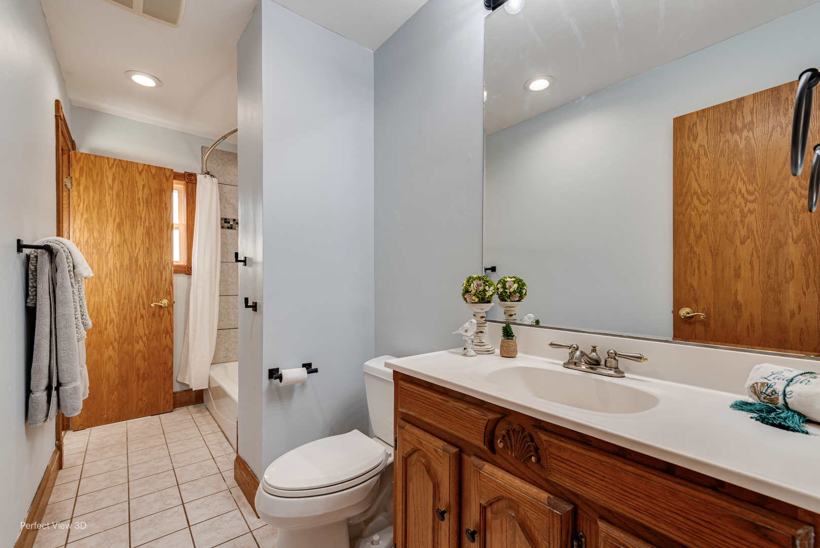 216 Kosan Circle Streamwood, IL 60107 - Photo 19 of 34 a bathroom with a granite countertop sink toilet and shower