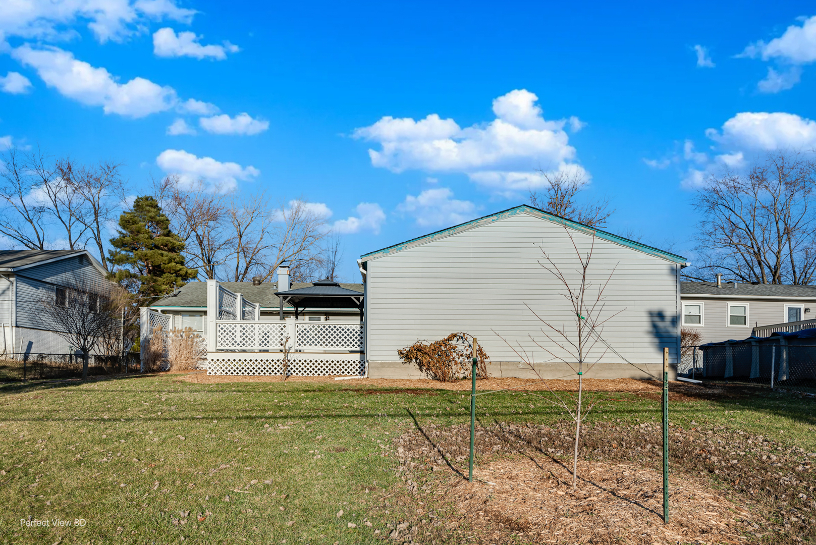 216 Kosan Circle Streamwood, IL 60107 - Photo 32 of 34 a view of a house with a yard