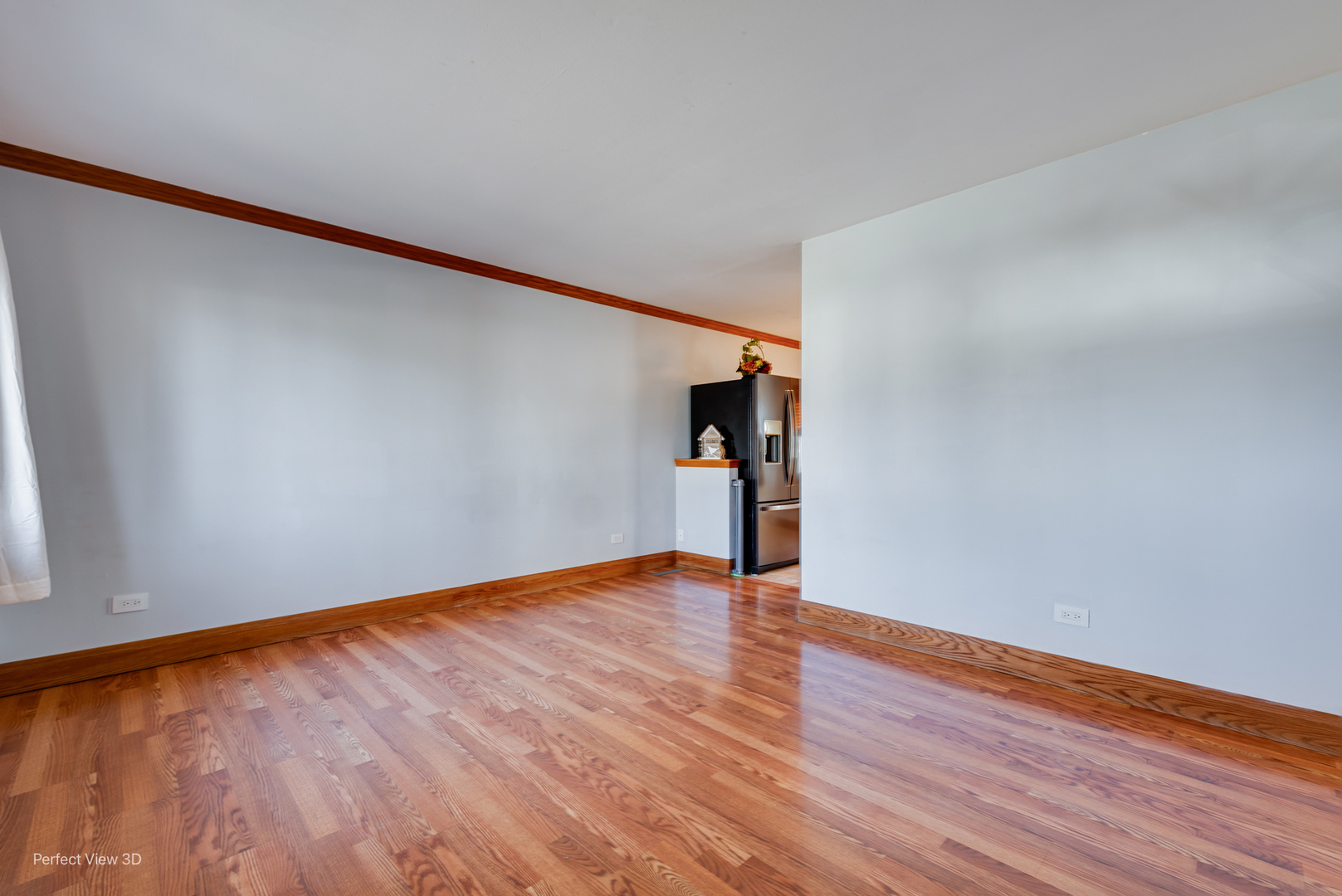 216 Kosan Circle Streamwood, IL 60107 - Photo 8 of 34 a view of an empty room with wooden floor and a window