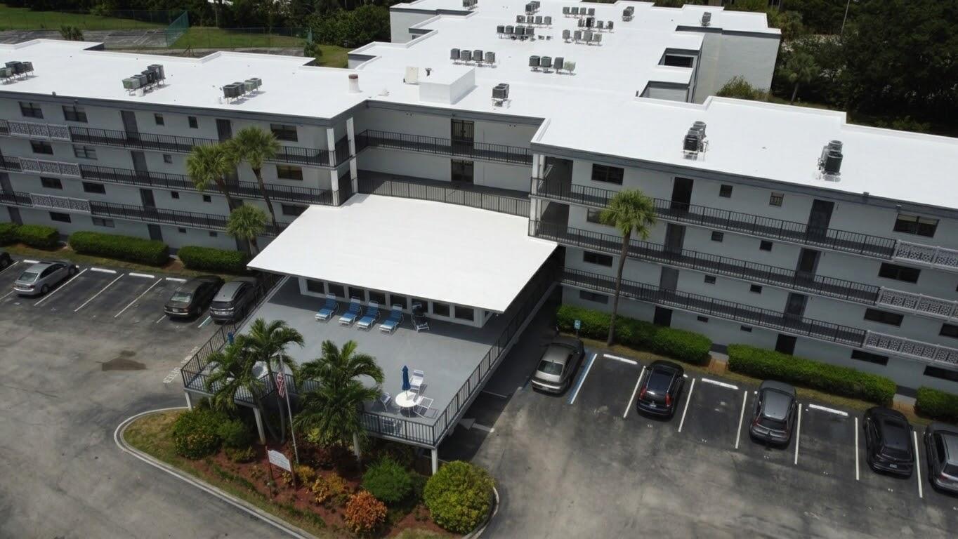 9233 Southwest 8th Street, Unit 218 Boca Raton, FL 33428 - Photo 1 of 22 White roof