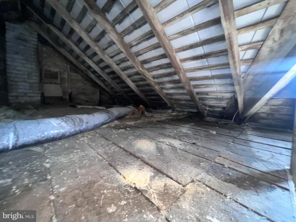 a view of a room with wooden roof