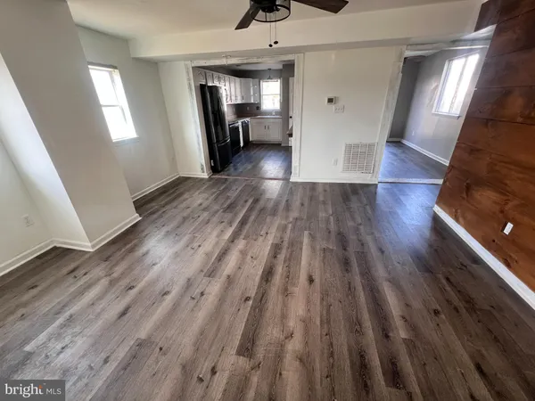 a view of livingroom with hardwood floor and window