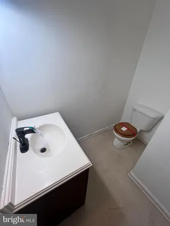 a bathroom with a sink and a vanity