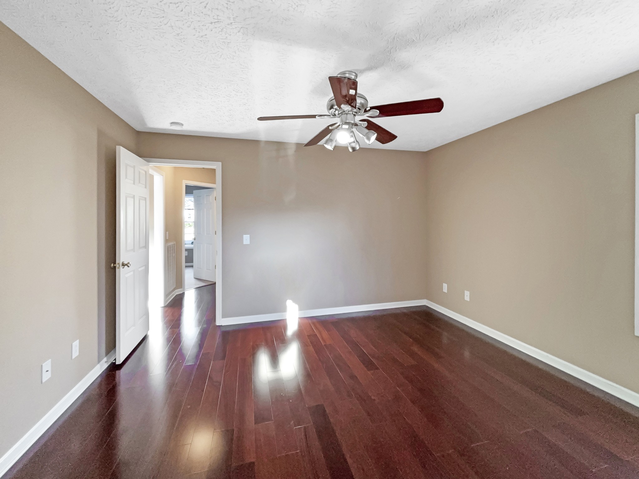 610 Chestnut Court Springfield, TN 37172 - Photo 4 of 17 a view of an empty room with wooden floor