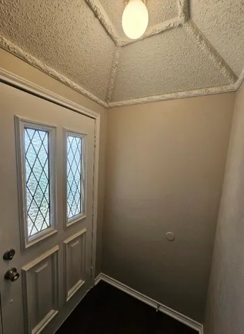 a view of a livingroom with wooden floor