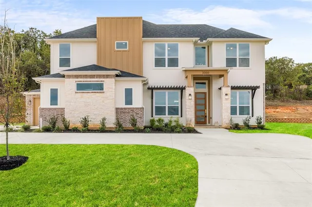 front view of a house and a yard