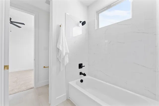 a bathroom with a bathtub