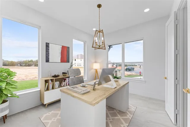 a living room with kitchen island furniture and a chandelier