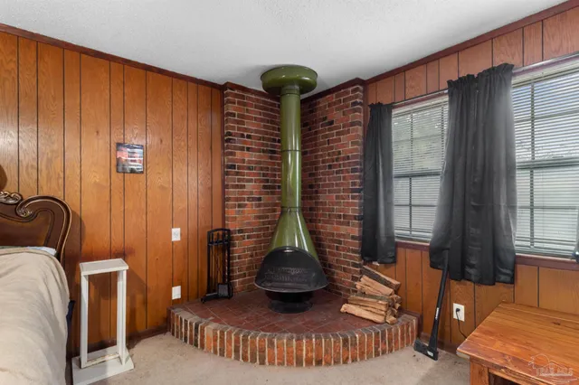 a view of balcony with furniture