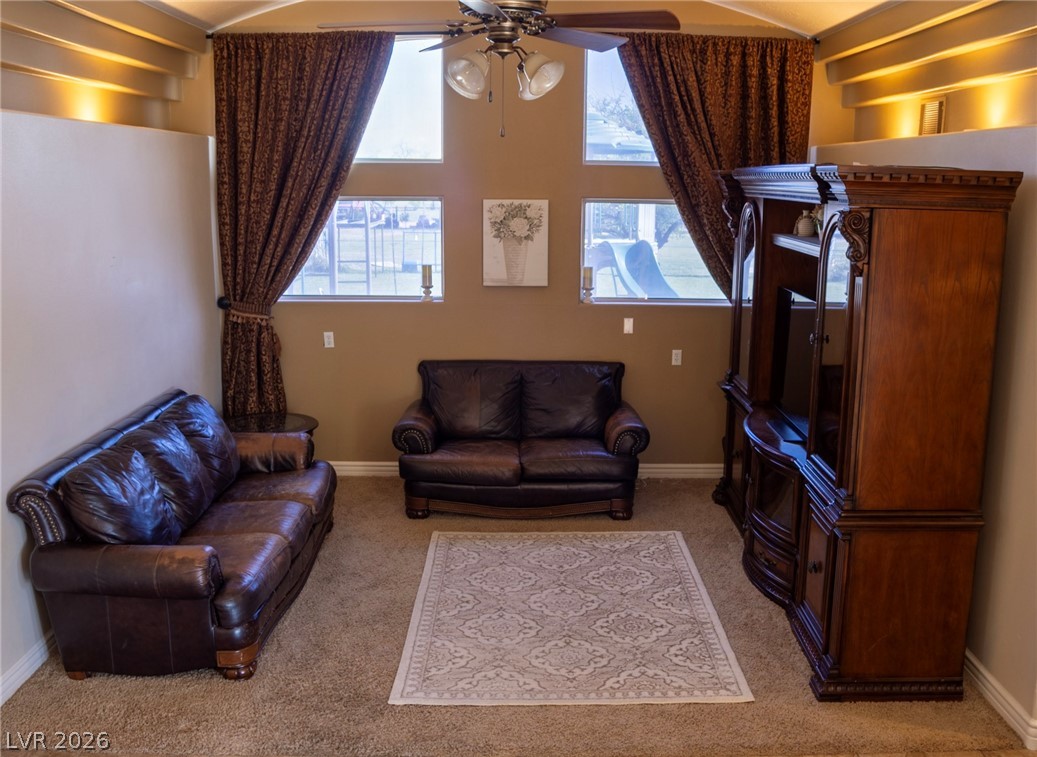 2775 Taylor Street Logandale, NV 89021 - Photo 14 of 41 This inviting living space features high ceilings and ample natural light.