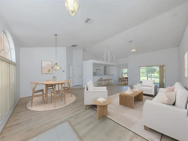 a living room with furniture and a table