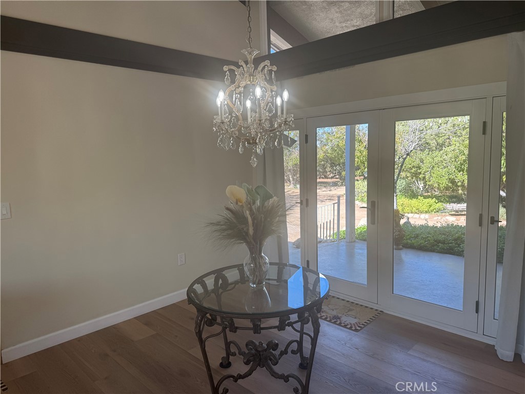 4501 Nielson Phelan, CA 92371 - Photo 12 of 33 a view of a room with furniture wooden floor and chandelier