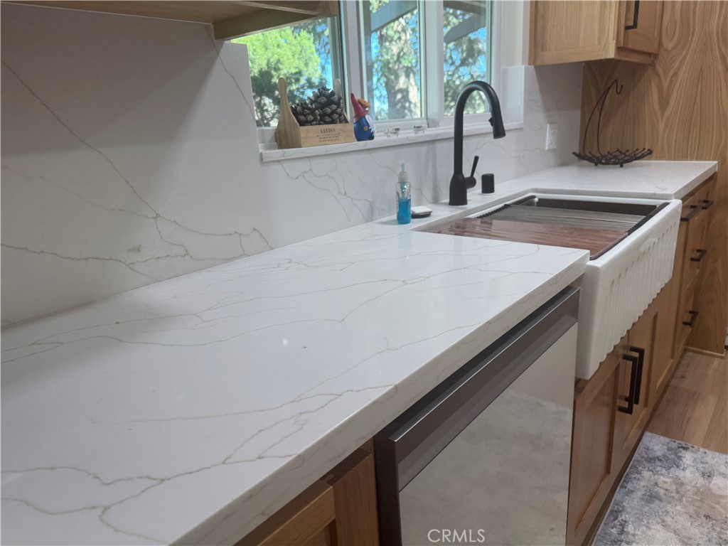4501 Nielson Phelan, CA 92371 - Photo 13 of 33 a kitchen with a sink and a window