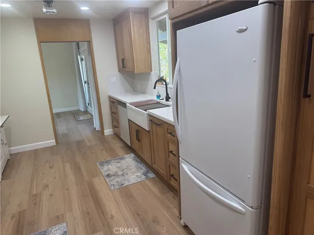 a bedroom with a bed and a tv in it