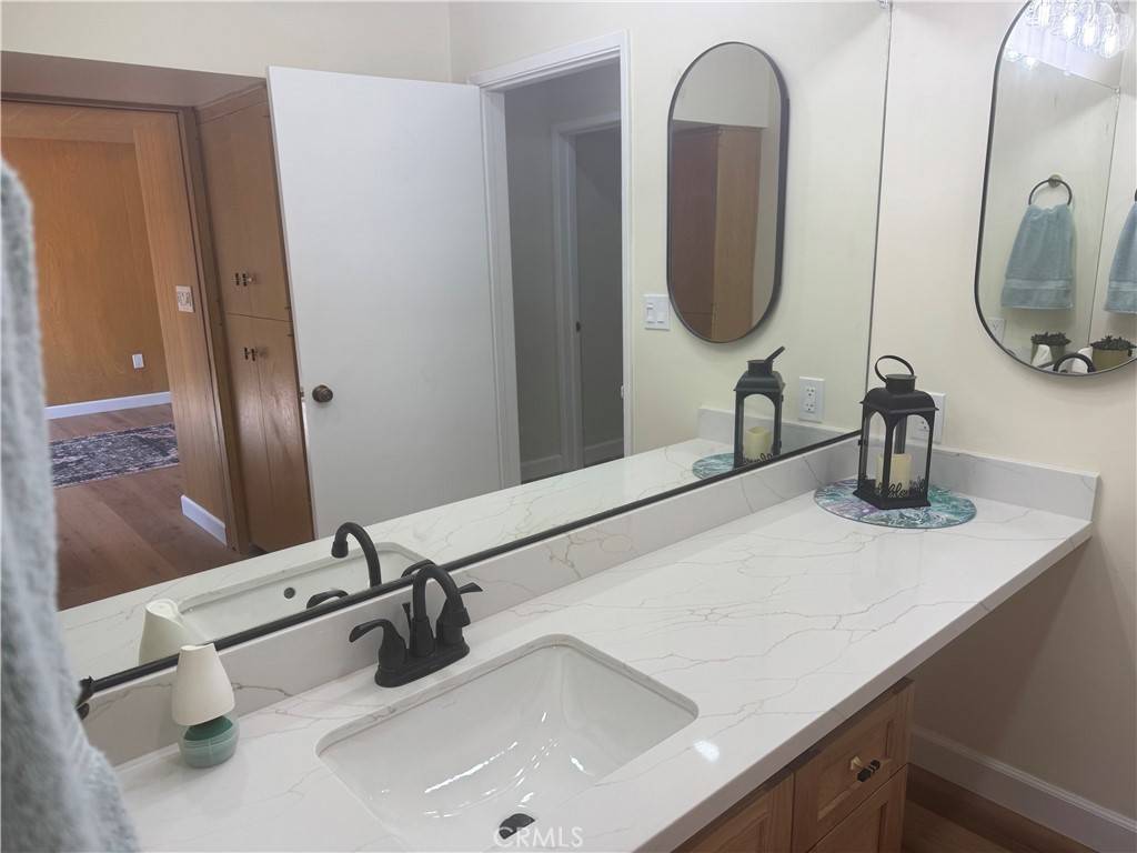 4501 Nielson Phelan, CA 92371 - Photo 24 of 33 a bathroom with a sink and a mirror