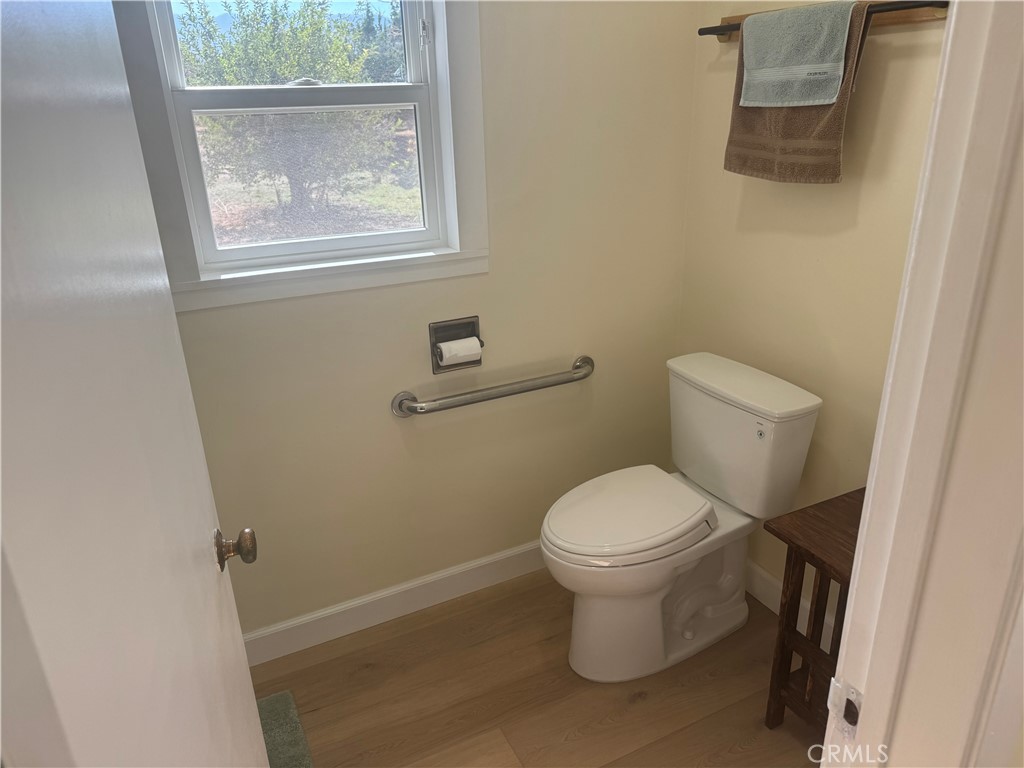 4501 Nielson Phelan, CA 92371 - Photo 27 of 33 a white toilet sitting next to a small bathroom