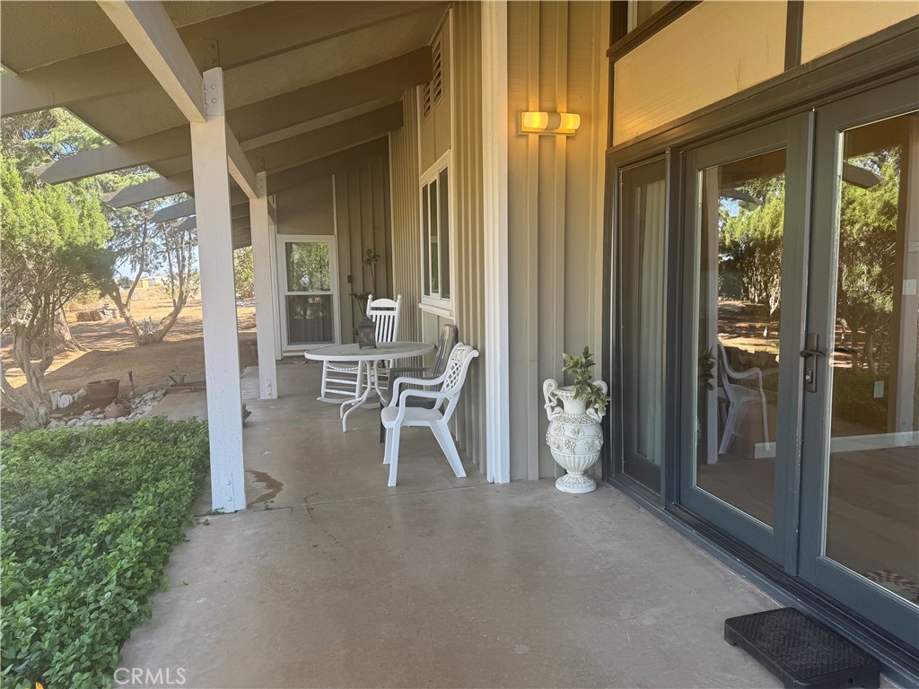 4501 Nielson Phelan, CA 92371 - Photo 4 of 33 a view of an entryway with outdoor seating