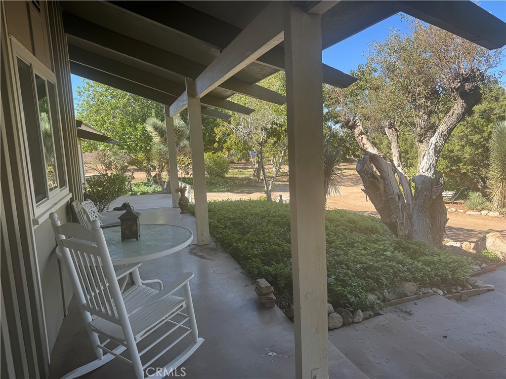 4501 Nielson Phelan, CA 92371 - Photo 5 of 33 a view of balcony with furniture and garden