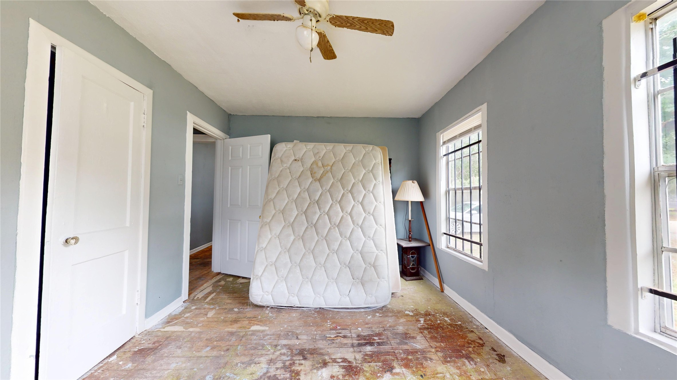 6604 Conley Street Houston, TX 77021 - Photo 17 of 28 a view of entryway with window and wooden floor