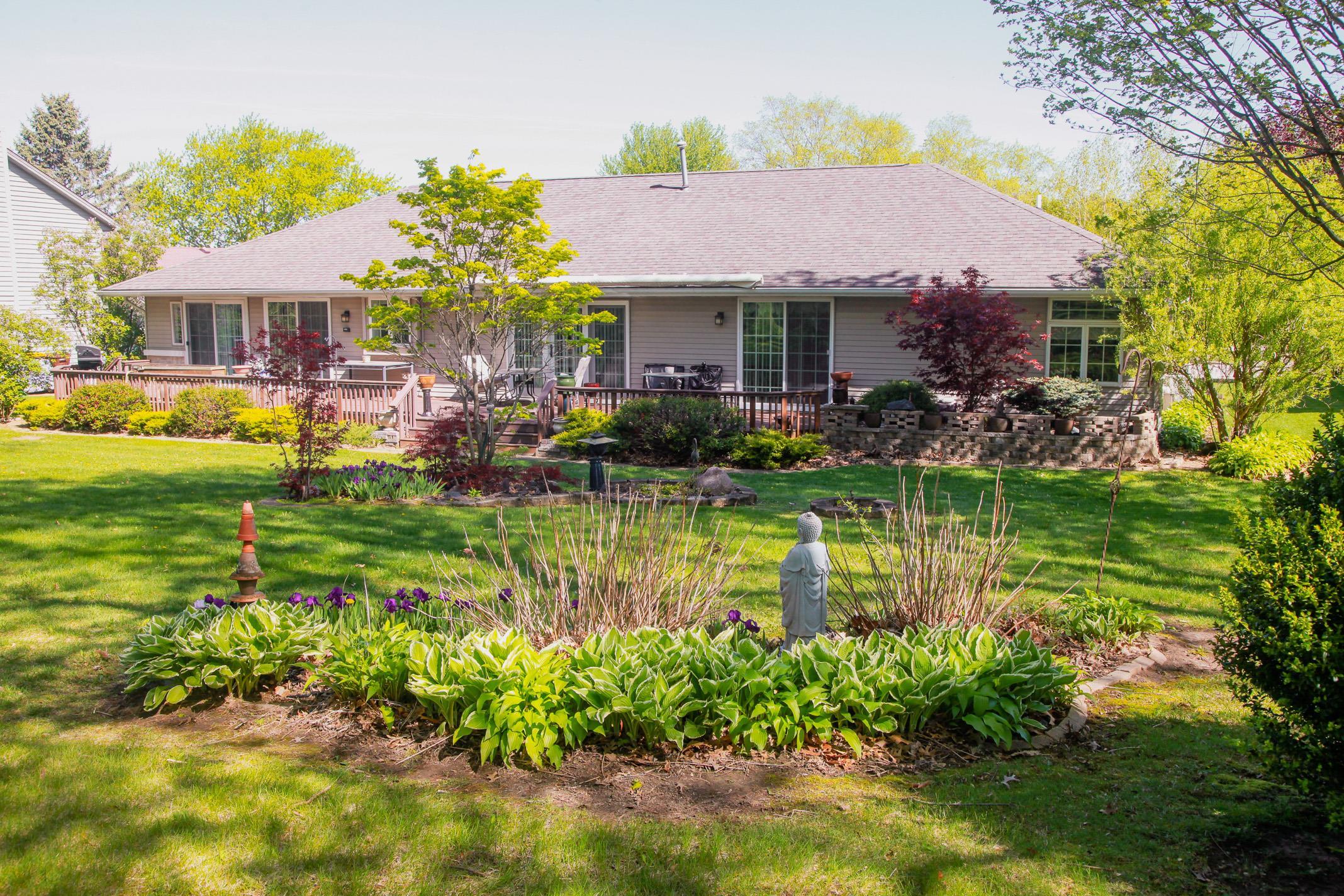 3001 Countryside Lane Freeport, IL 61032 - Photo 42 of 47 a front view of a house with swimming pool having outdoor seating