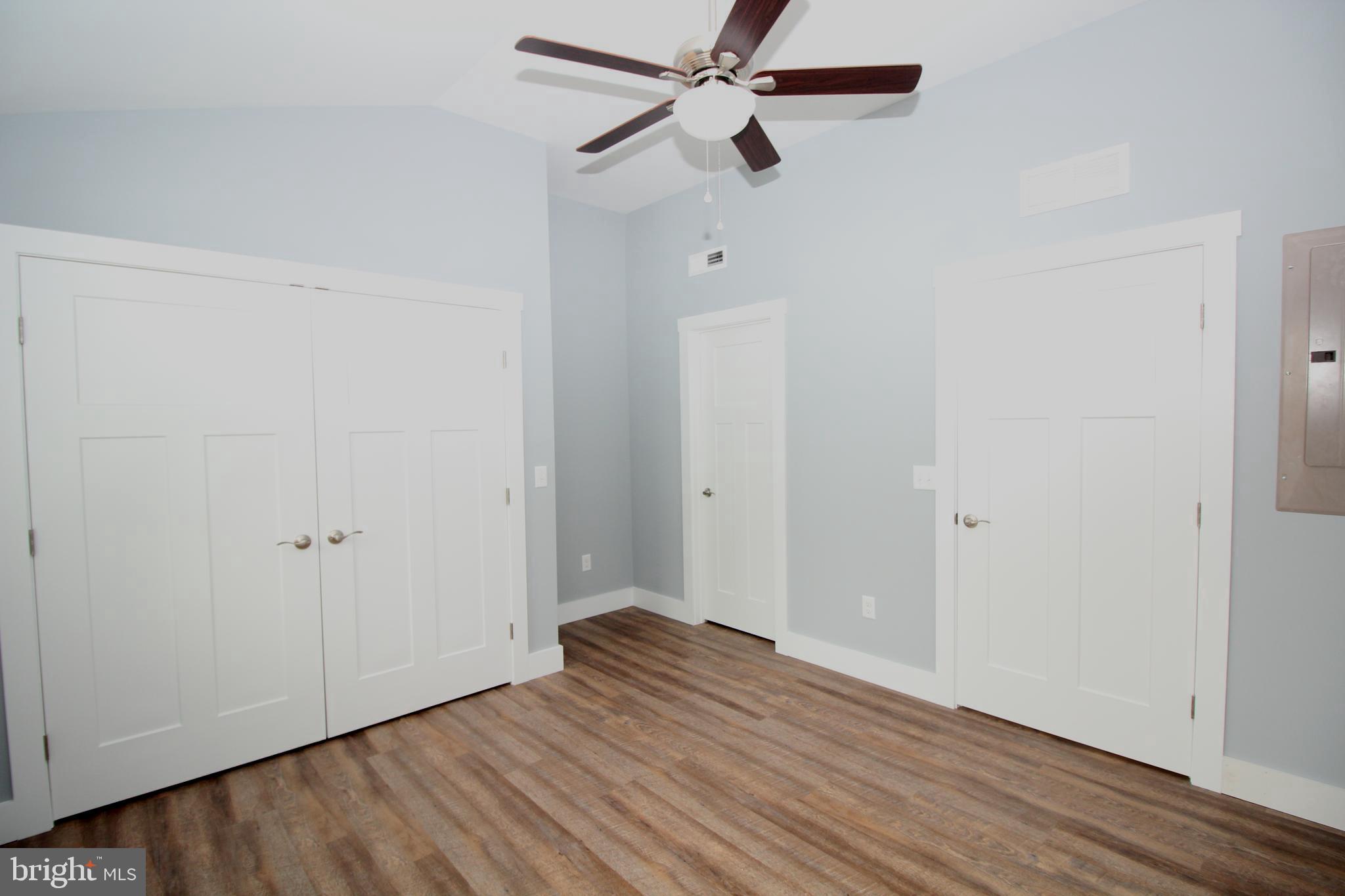 306 Main Street Dover, DE 19901 - Photo 18 of 33 wooden floor in an empty room