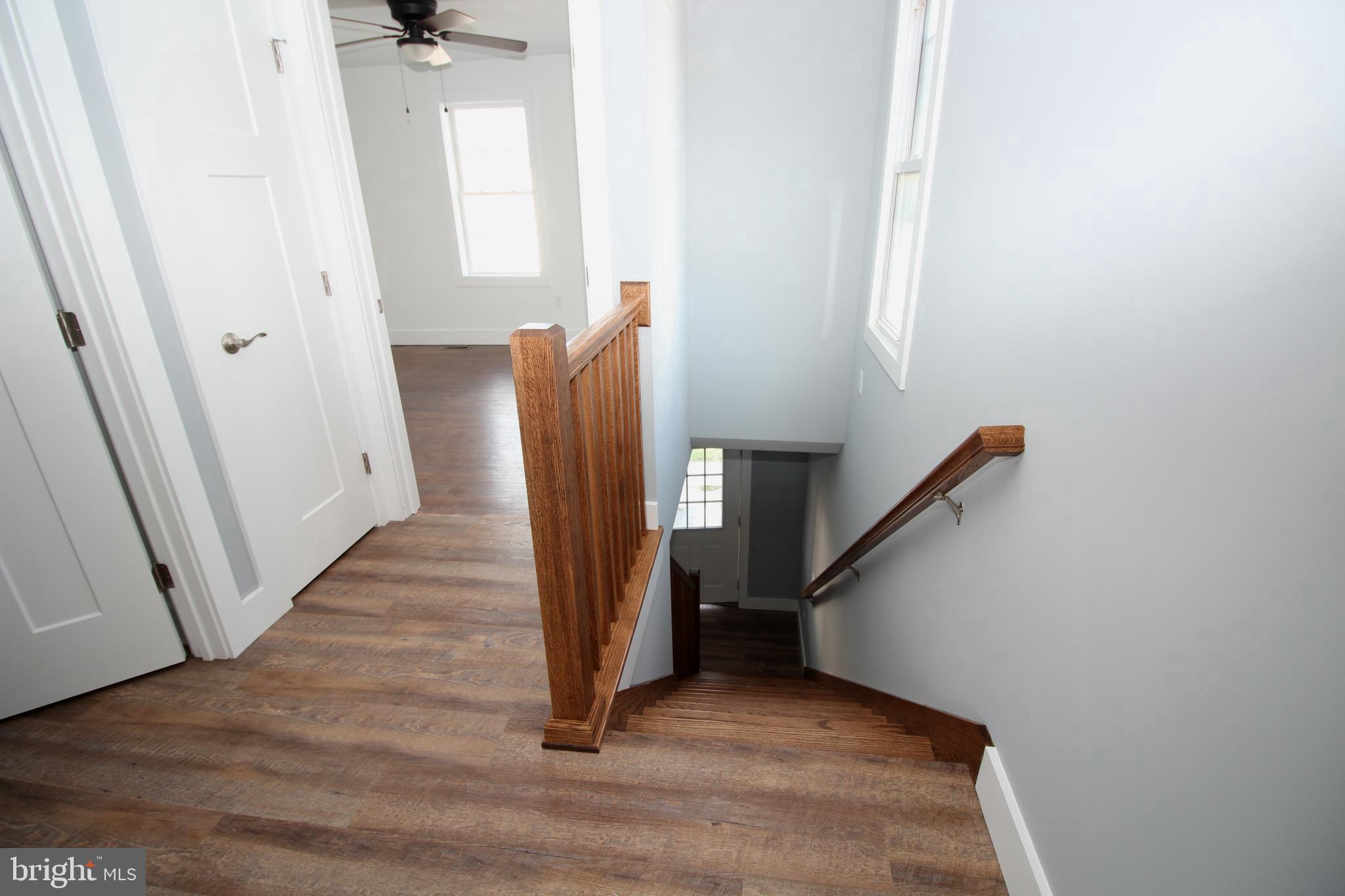 306 Main Street Dover, DE 19901 - Photo 29 of 33 a view of entryway and hall with wooden floor
