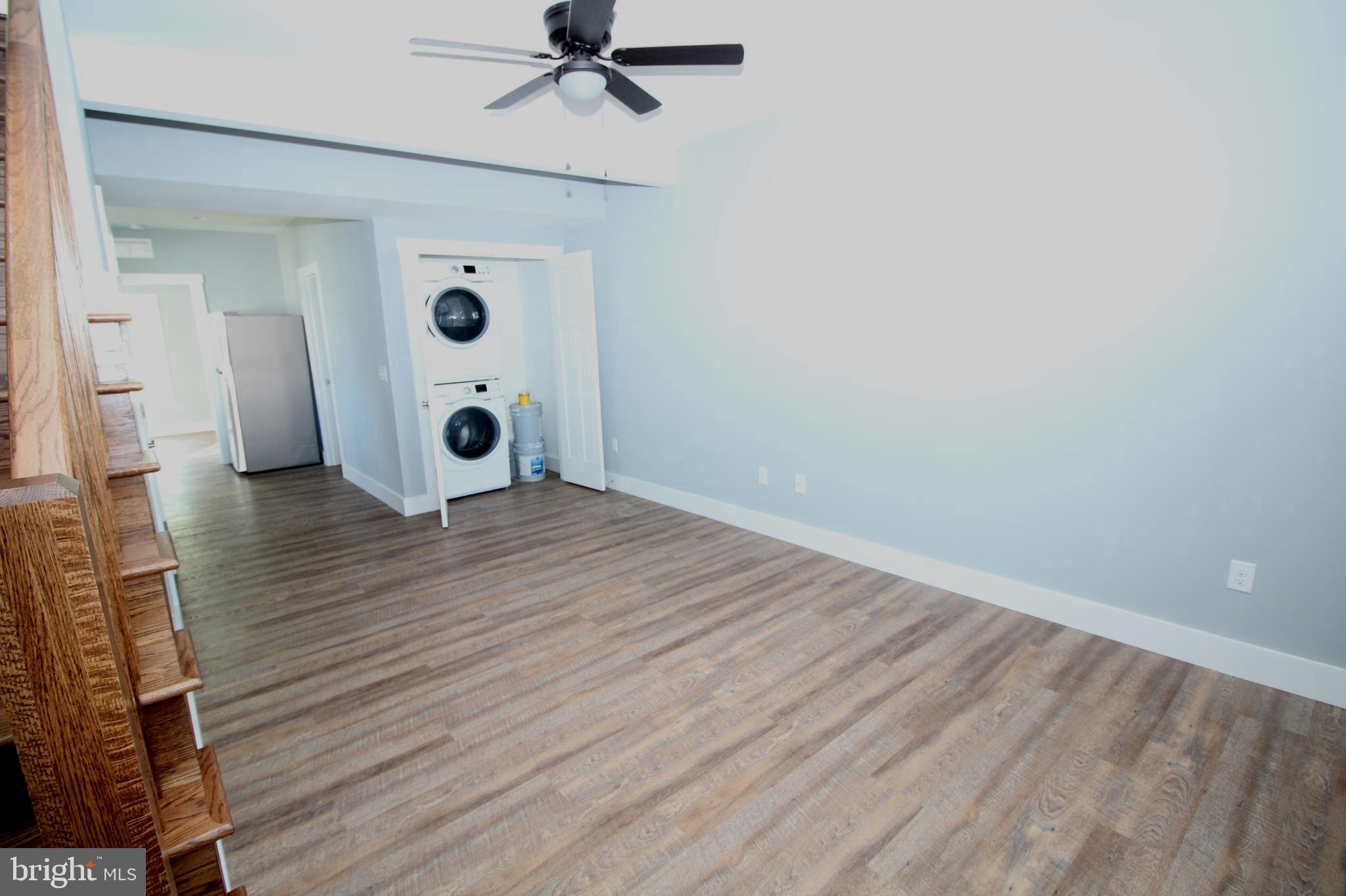 306 Main Street Dover, DE 19901 - Photo 5 of 33 wooden floor in an empty room