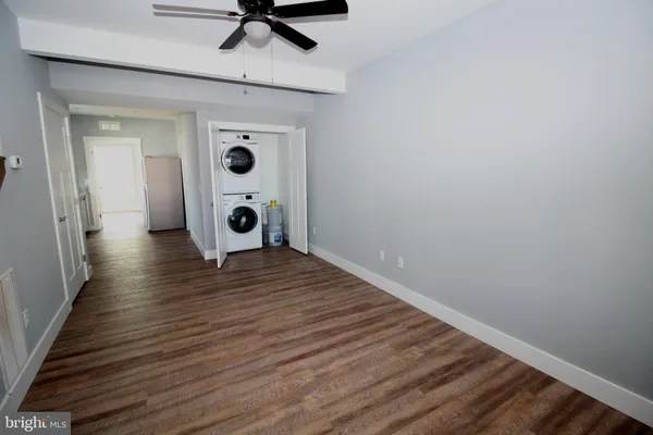 a view of a hardwood floor in a house
