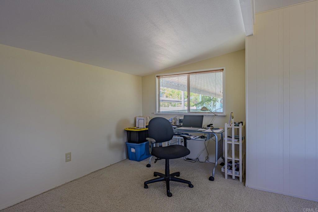 4650 Dulin Road, Unit 27 Fallbrook, CA 92003 - Photo 15 of 37 a view of a workspace with furniture and a window