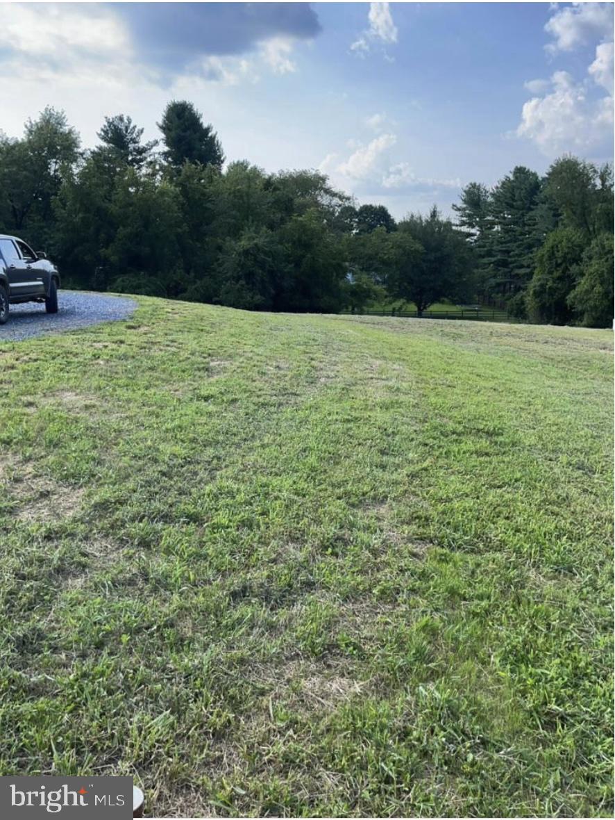 13943 Old Hanover Road Reisterstown, MD 21136 - Photo 10 of 17 a view of a swimming pool with a yard