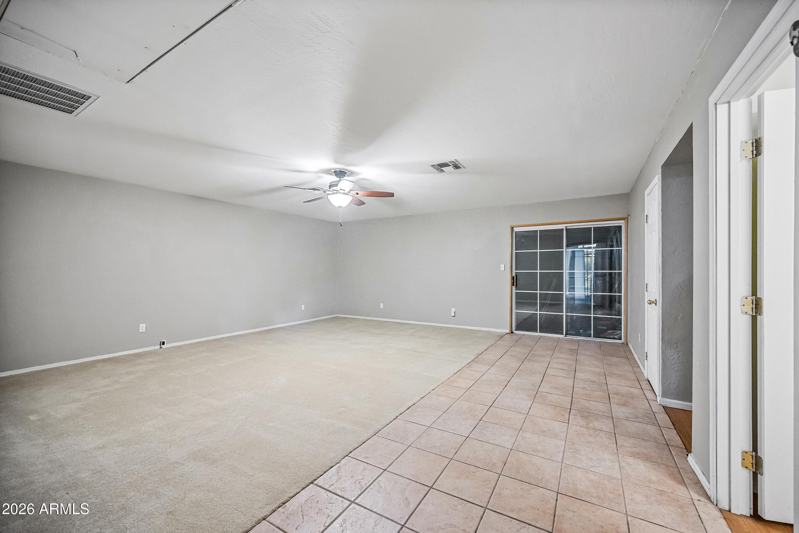 322 East Redfield Road Chandler, AZ 85225 - Photo 28 of 50 a view of an empty room with a window
