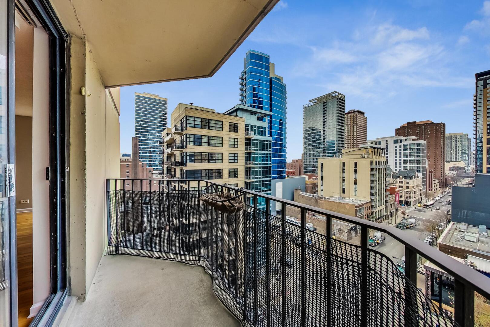 70 West Huron Street, Unit 1103 Chicago, IL 60654 - Photo 15 of 18 a view of a balcony with city view
