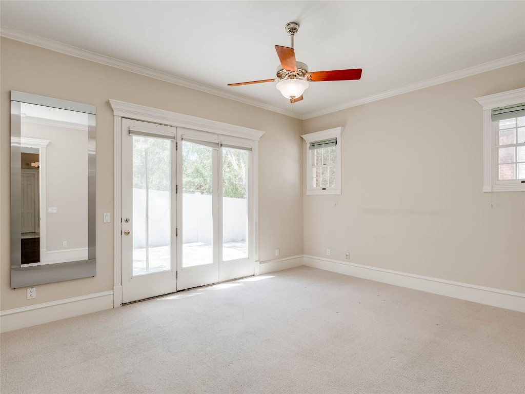 4010 Long Champ Drive, Unit 23 Austin, TX 78746 - Photo 14 of 38 a view of an empty room with a window