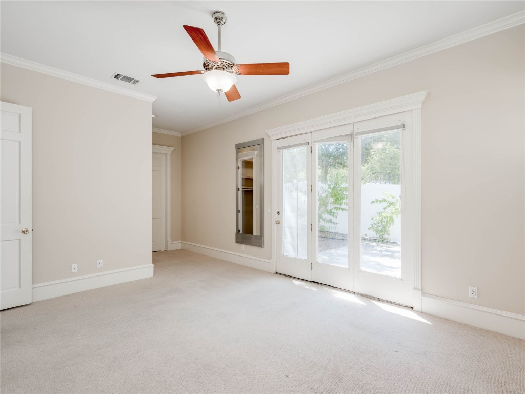 4010 Long Champ Drive, Unit 23 Austin, TX 78746 - Photo 15 of 38 a view of an empty room with a window
