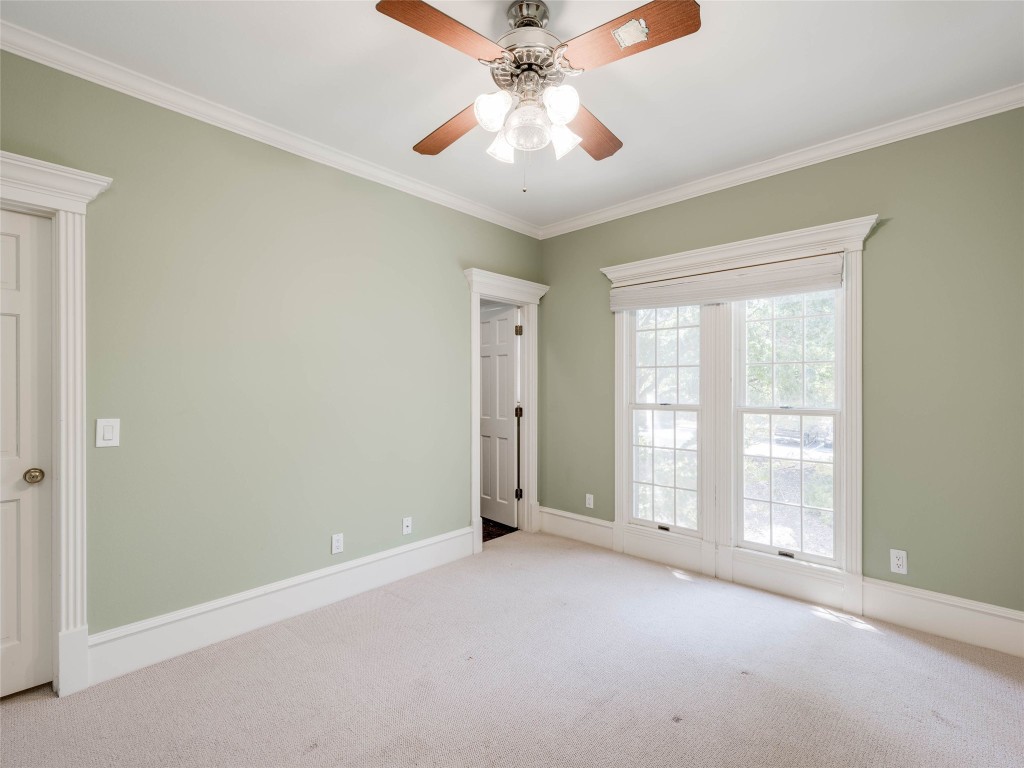 4010 Long Champ Drive, Unit 23 Austin, TX 78746 - Photo 25 of 38 a view of an empty room with a window