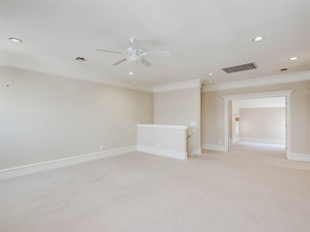 4010 Long Champ Drive, Unit 23 Austin, TX 78746 - Photo 29 of 38 wooden floor in an empty room
