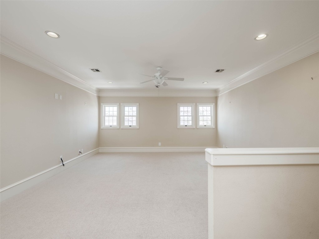 4010 Long Champ Drive, Unit 23 Austin, TX 78746 - Photo 31 of 38 a view of an empty room with a window