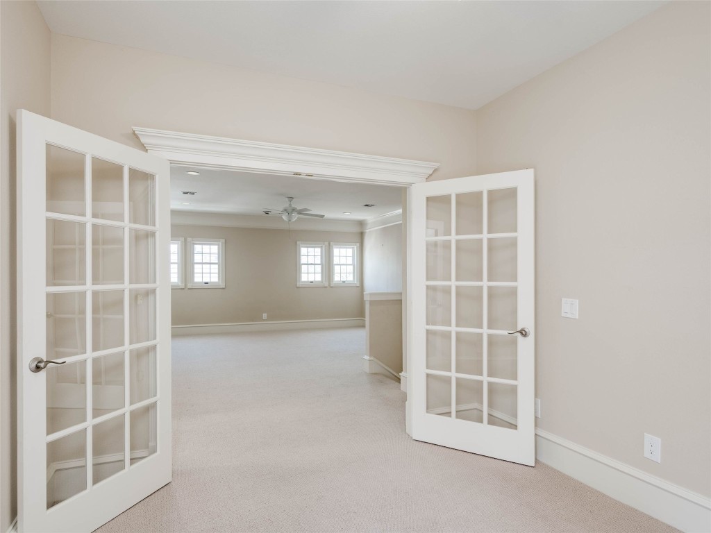 4010 Long Champ Drive, Unit 23 Austin, TX 78746 - Photo 34 of 38 a view of an empty room with a window