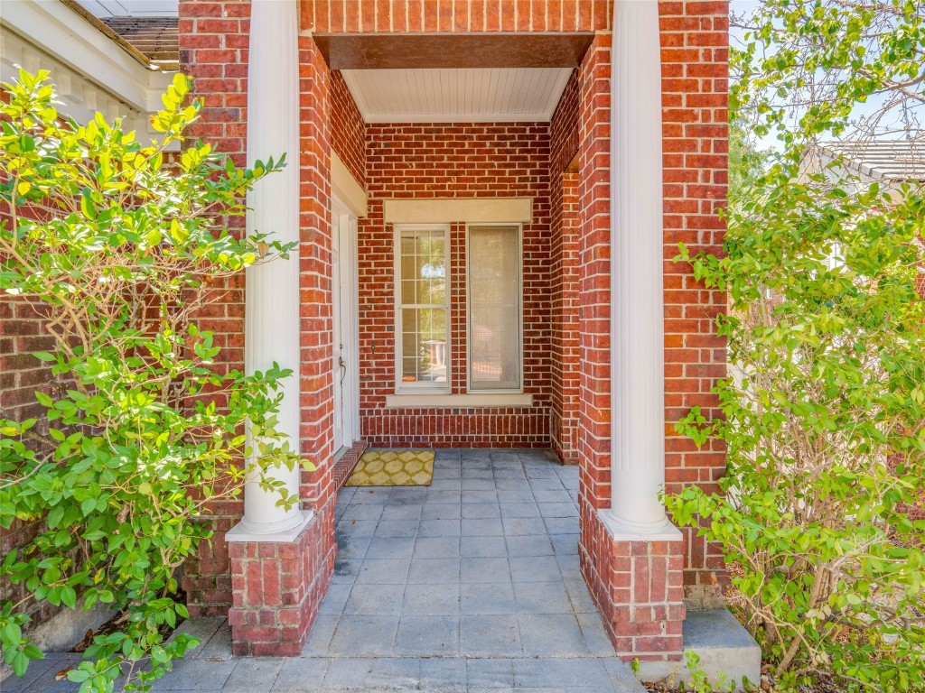 4010 Long Champ Drive, Unit 23 Austin, TX 78746 - Photo 37 of 38 a front view of a house with a yard