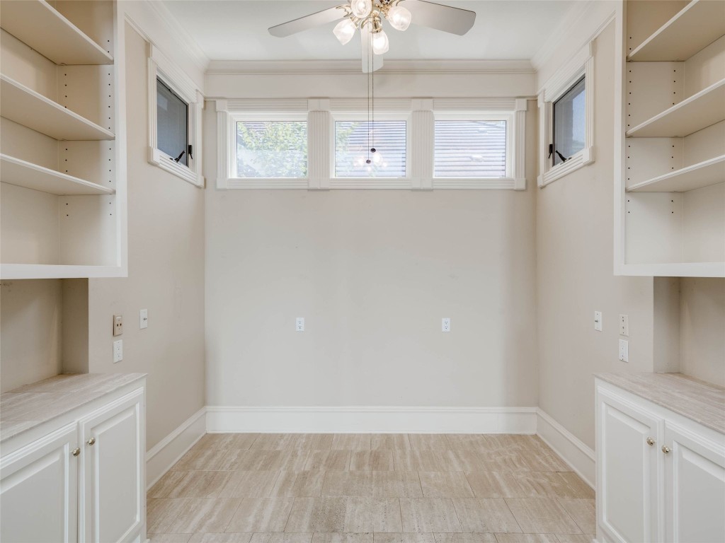 4010 Long Champ Drive, Unit 23 Austin, TX 78746 - Photo 4 of 38 a view of an empty room with a window