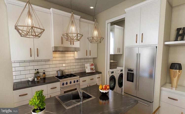 44 Parkside Terrace Berkeley Springs, WV 25411 - Photo 5 of 10 a kitchen with stainless steel appliances granite countertop a refrigerator and a stove top oven