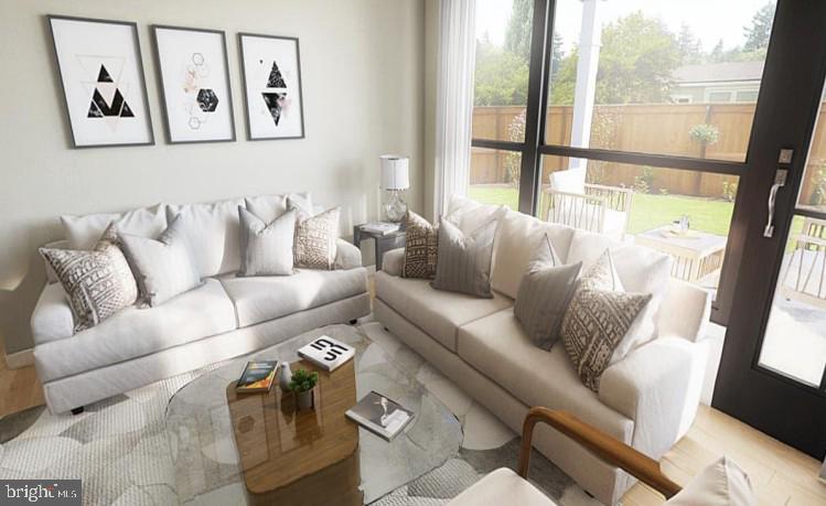 44 Parkside Terrace Berkeley Springs, WV 25411 - Photo 6 of 10 a living room with furniture and a large window